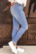 Load image into Gallery viewer, Women&#39;s Light Blue Washed Ripped Jeans
